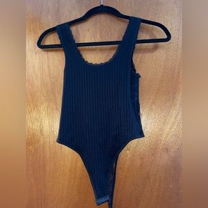“Dynamic seamless apparel” black bodysuit
